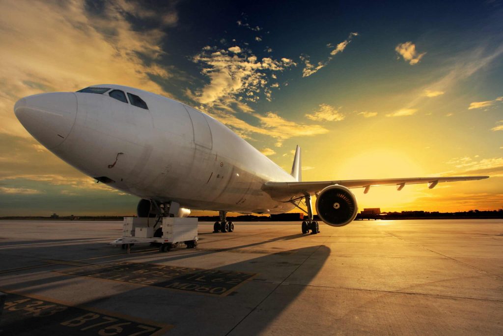 Airplane at sunset – back lit