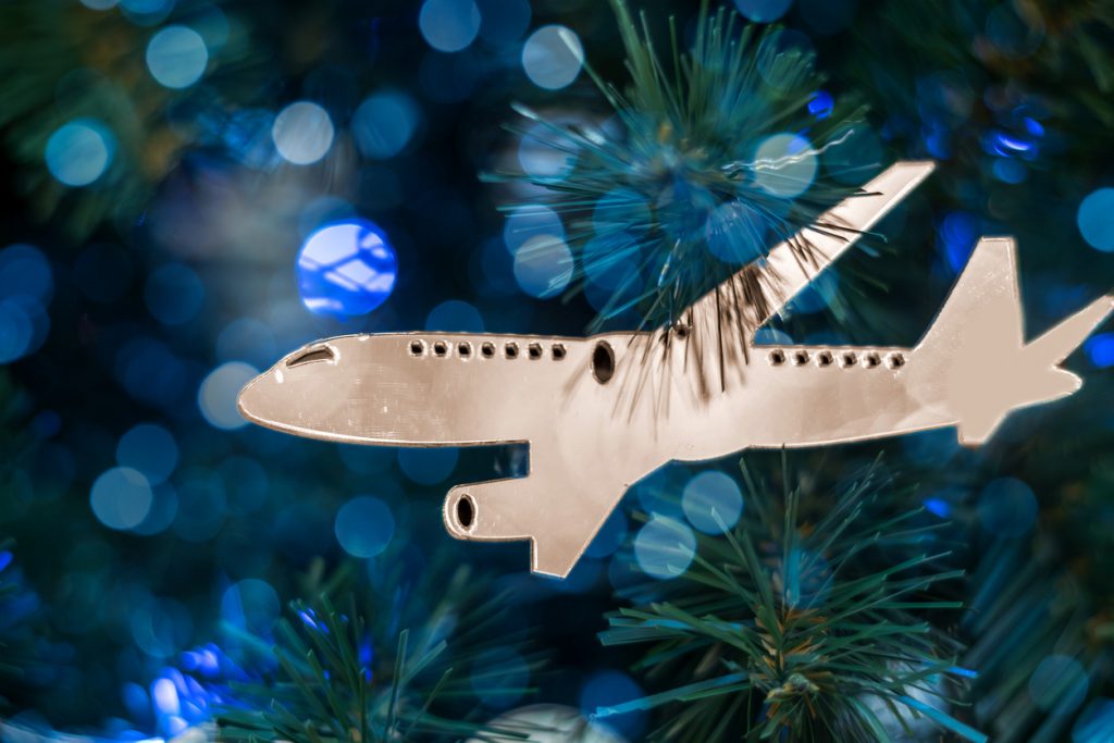 Christmas tree ornament in form of silver airplane