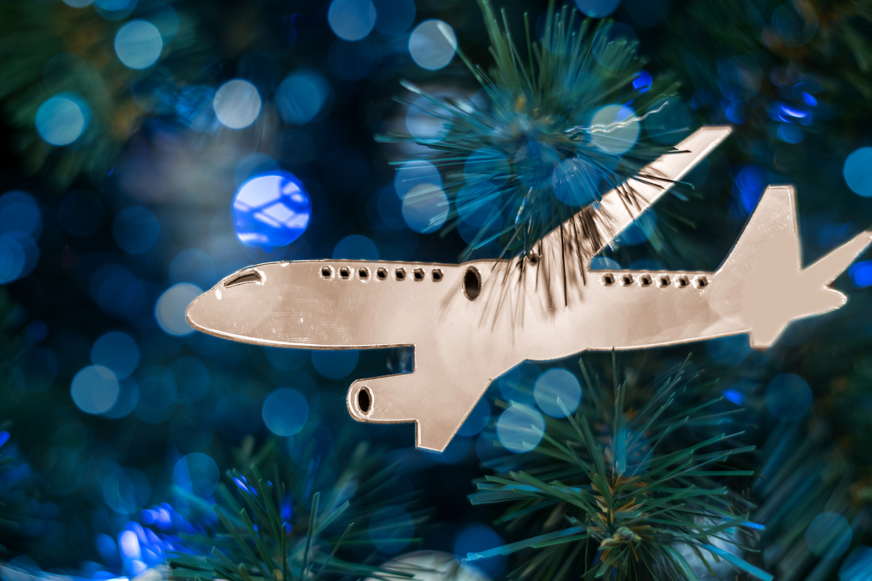 Christmas tree ornament in form of silver airplane