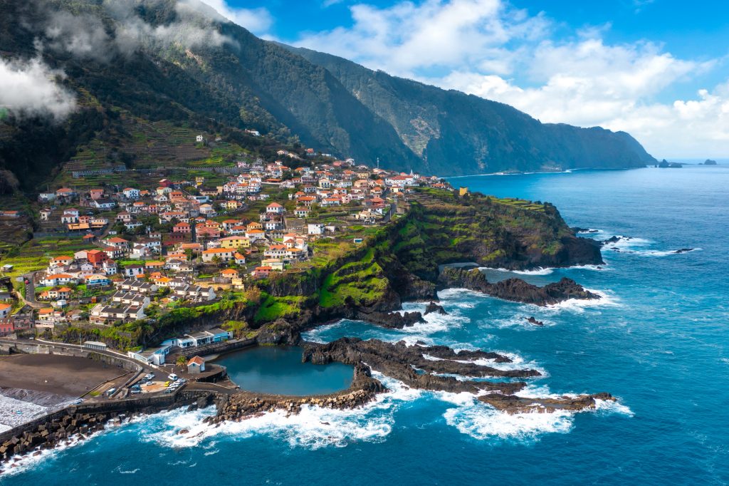 Aerial view of Madeira island. Land meets ocean in Seixal, Madeira, Portugal